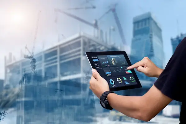 construction worker using an ipad