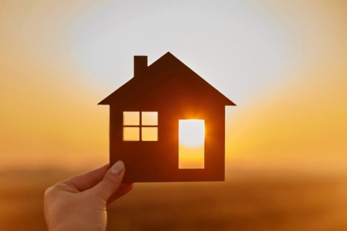 wooden house against the sun Right of Light House Concept