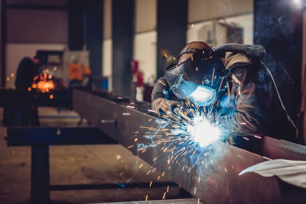 Industrial Welder Using Torch