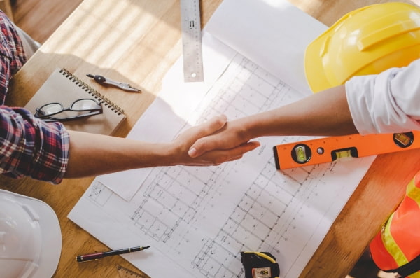 construction-worker-team-contractor-hand-shake